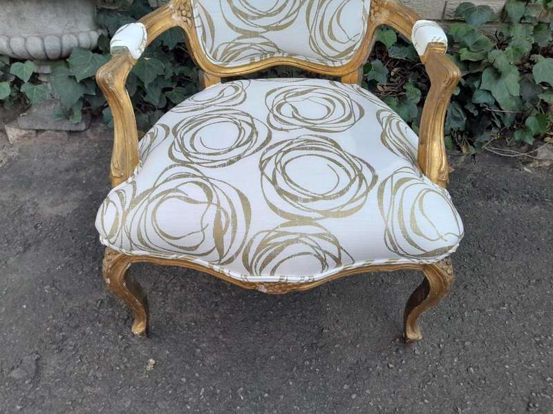 A 19th Century Pair of French Carved and Gilded Wooden Armchairs Upholstered in a Custom Made Fab...