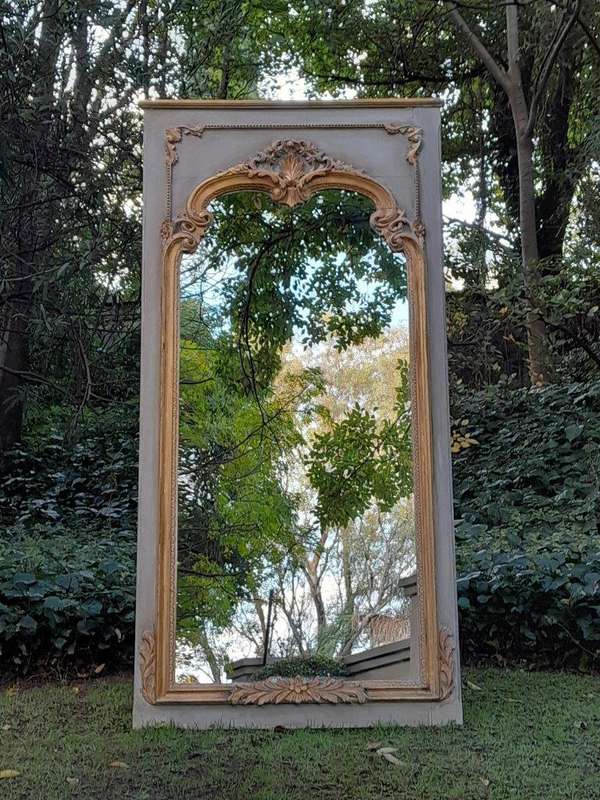 A 20TH Century French Style Carved, Gilded and Painted Mirror of Large Proportion