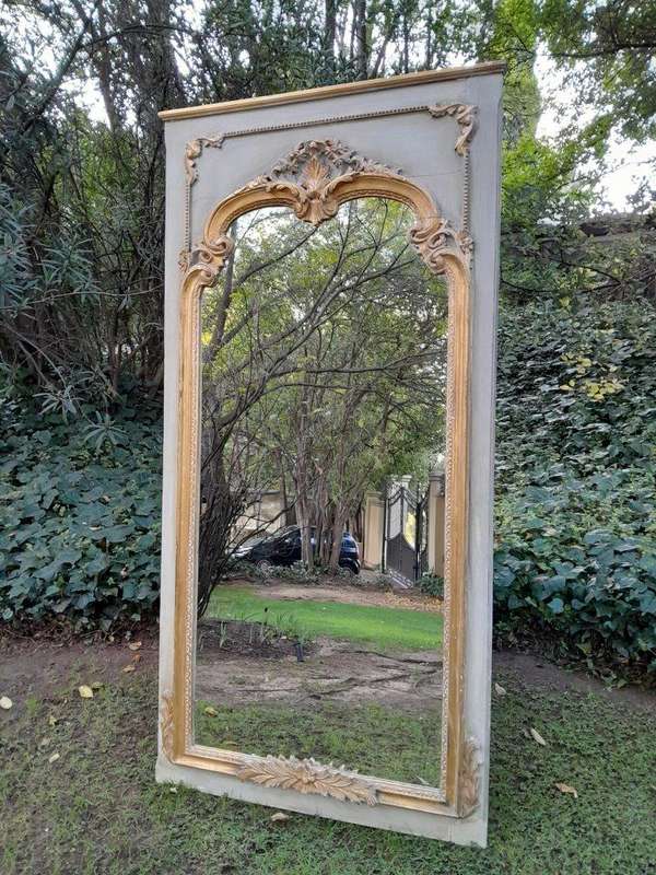 A 20TH Century French Style Carved, Gilded and Painted Mirror of Large Proportion