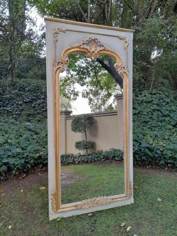 A 20TH Century French Style Carved, Gilded and Painted Mirror of Large Proportion