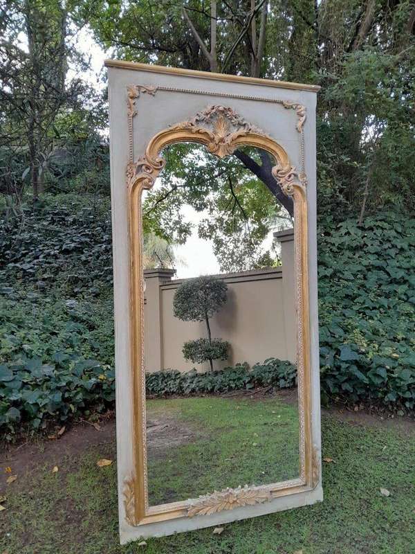 A 20TH Century French Style Carved, Gilded and Painted Mirror of Large Proportion