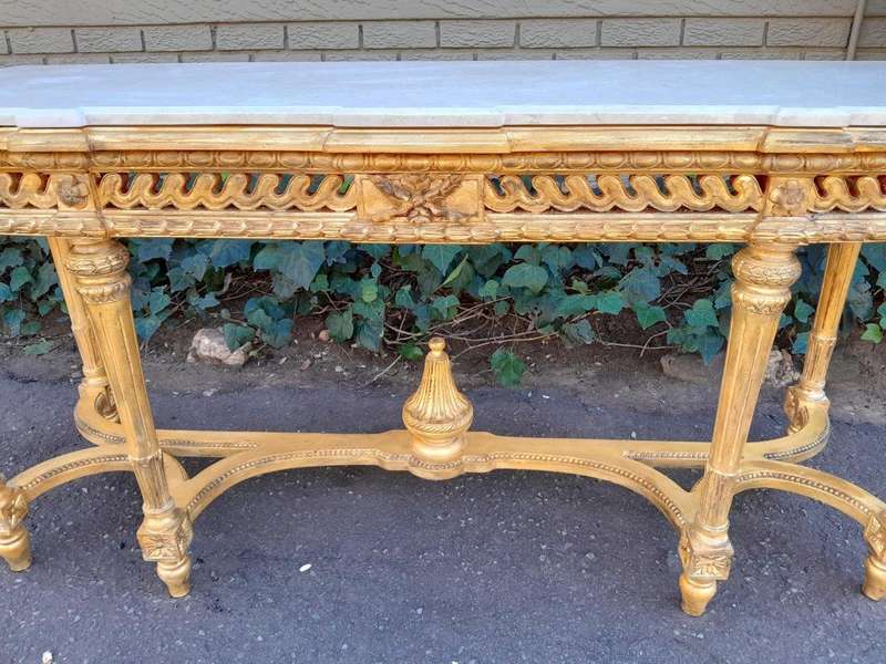 A 20th Century French Louis SVI Style Hand Gilded Console Table With Cream Marble Top