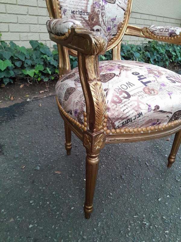 A 20th Century French Louis XVI Style Pair of Ornately Carved Gold Armchairs