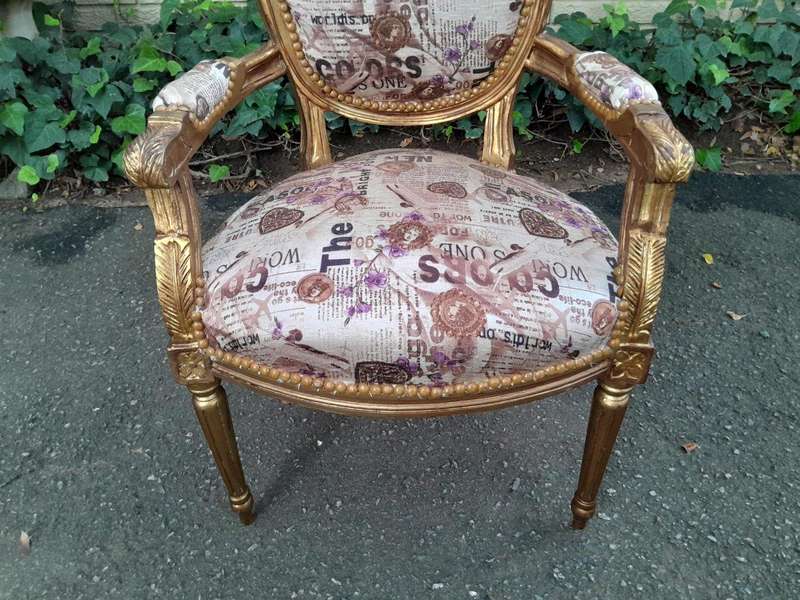 A 20th Century French Louis XVI Style Pair of Ornately Carved Gold Armchairs