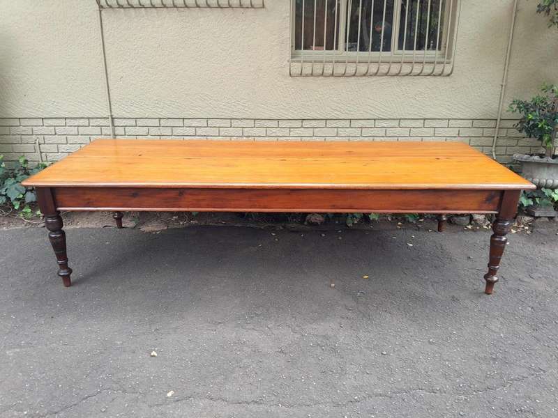 An Antique 20th Century Large Yellowwood and Stinkwood Dining Table