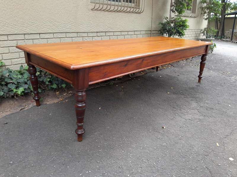 An Antique 20th Century Large Yellowwood and Stinkwood Dining Table