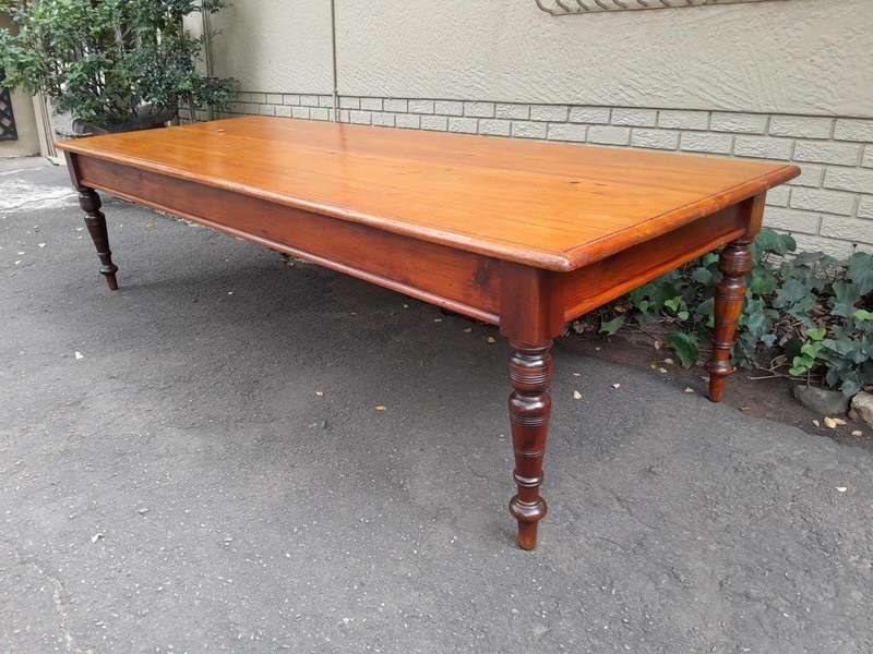 An Antique 20th Century Large Yellowwood and Stinkwood Dining Table