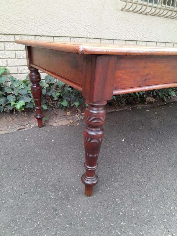 An Antique 20th Century Large Yellowwood and Stinkwood Dining Table