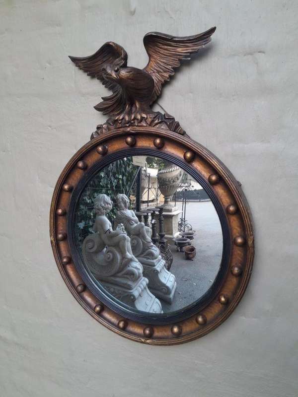 An Antique Regency Convex Eagle Mirror