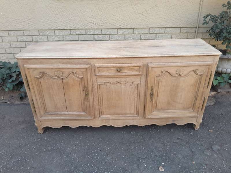 A 19th Century  Circa 1870 Carved Oak Side Board / Server With Drawer and Doors with Brass Mount...