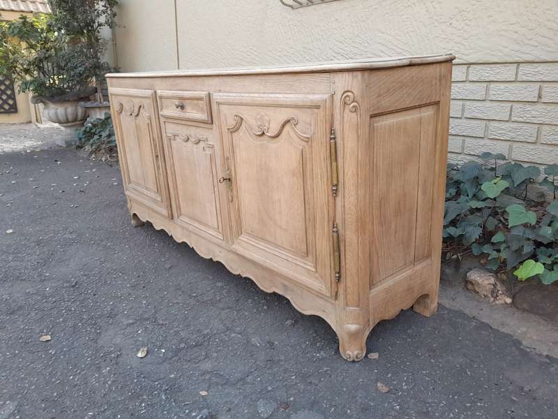 A 19th Century  Circa 1870 Carved Oak Side Board / Server With Drawer and Doors with Brass Mount...