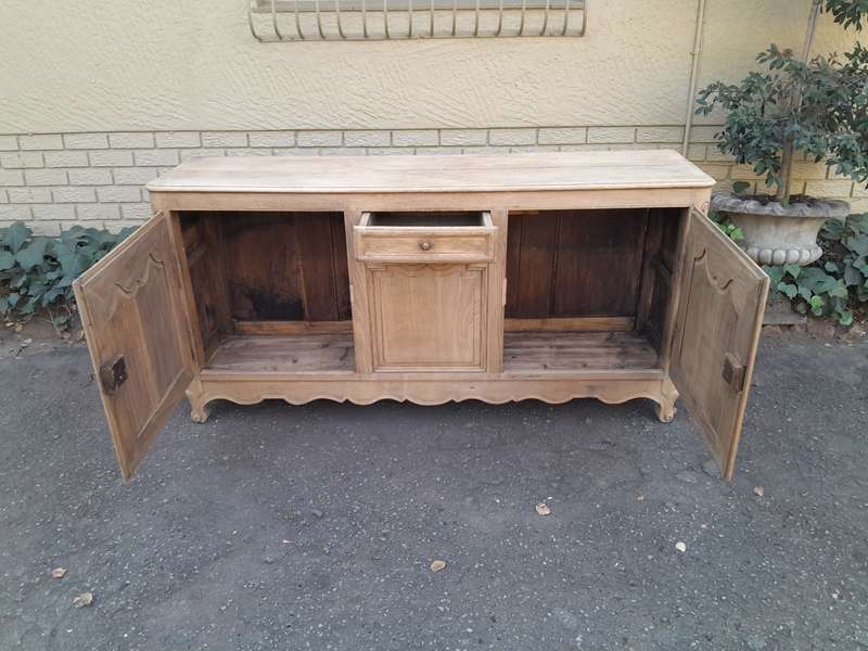A 19th Century  Circa 1870 Carved Oak Side Board / Server With Drawer and Doors with Brass Mount...