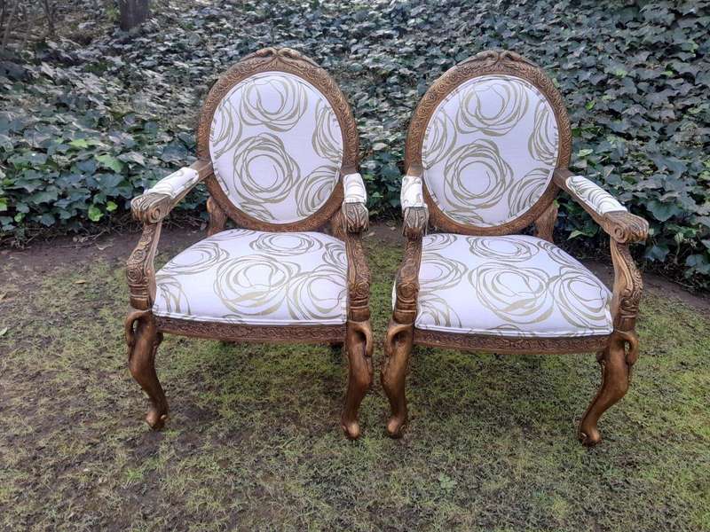 A Pair of 20th Century Style Gilt Arm Chairs