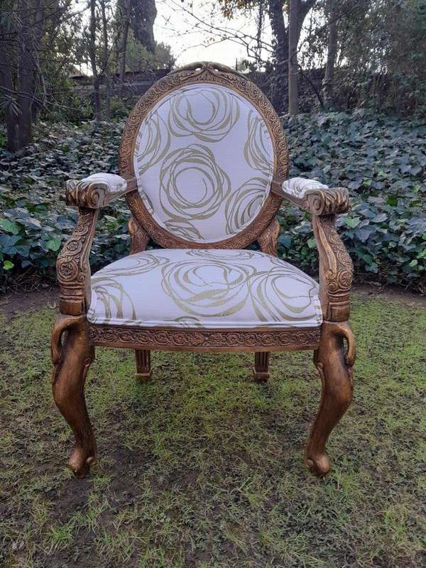 A Pair of 20th Century Style Gilt Arm Chairs