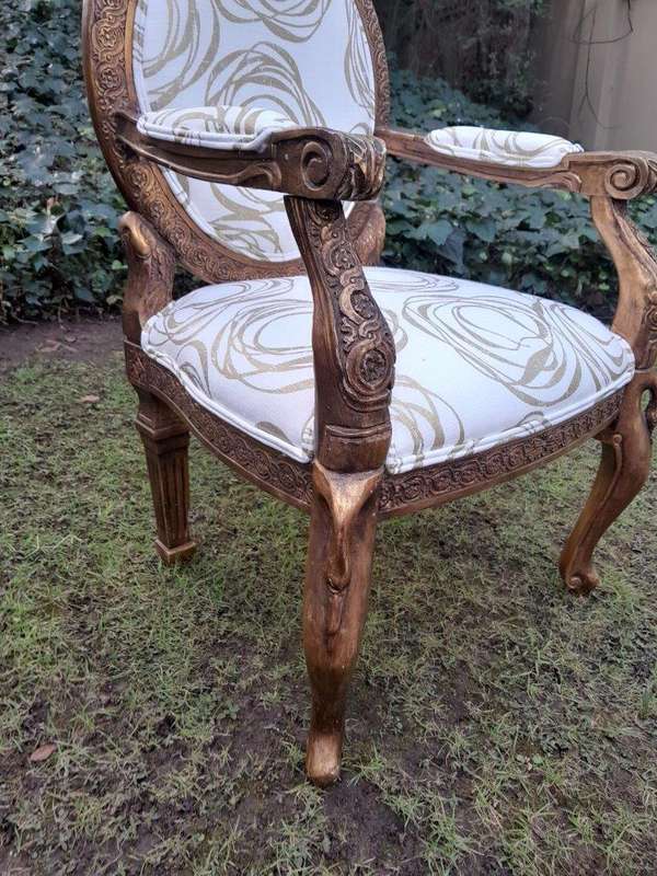 A Pair of 20th Century Style Gilt Arm Chairs