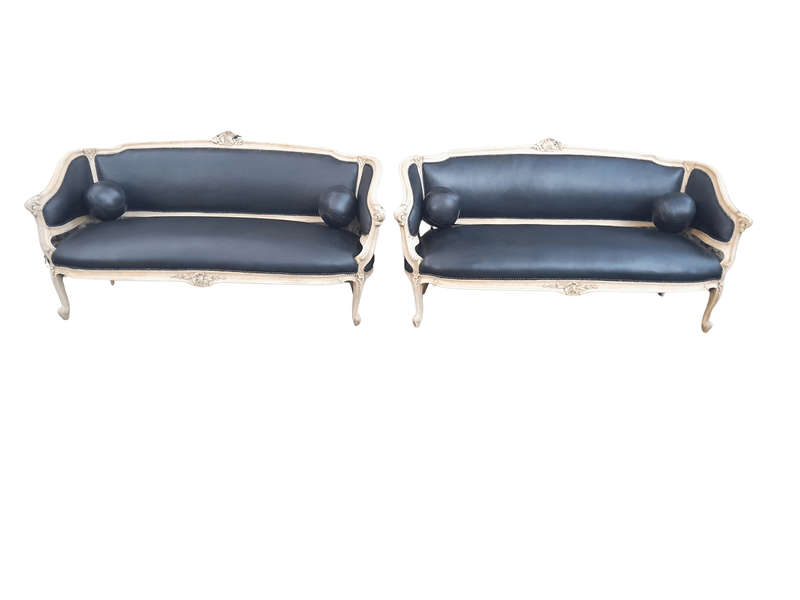 A 20th Century Pair of French Style Carved Walnut Settees in a Contemporary Bleached Finish and U...