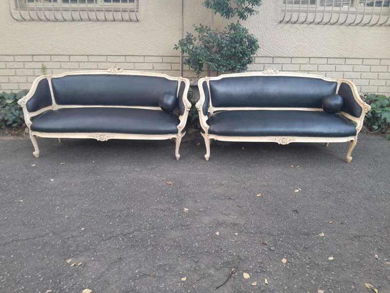 A 20th Century Pair of French Style Carved Walnut Settees in a Contemporary Bleached Finish and U...