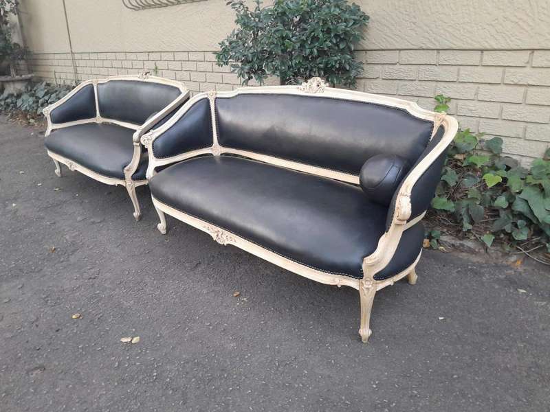 A 20th Century Pair of French Style Carved Walnut Settees in a Contemporary Bleached Finish and U...