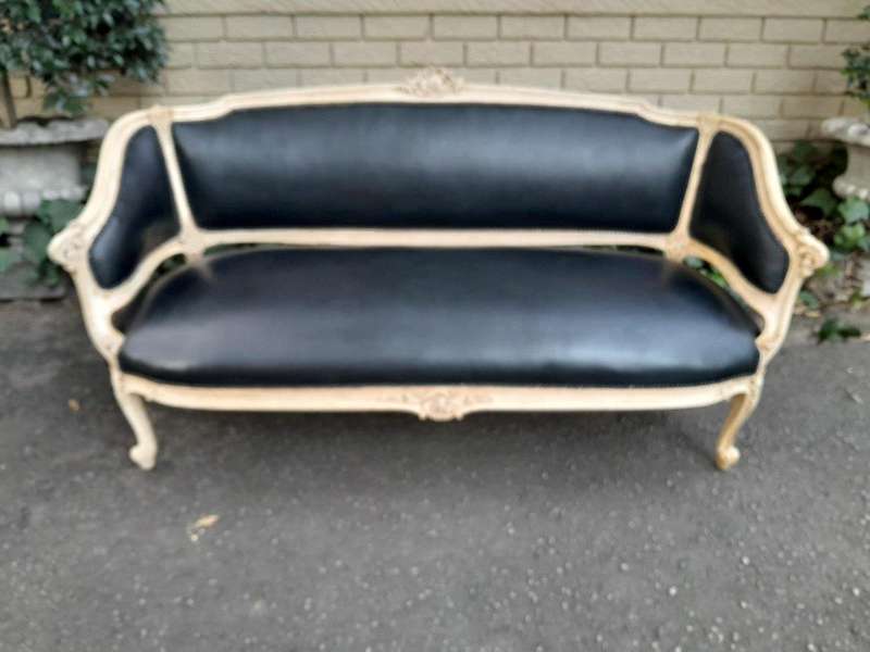 A 20th Century Pair of French Style Carved Walnut Settees in a Contemporary Bleached Finish and U...