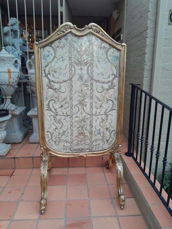 An Antique Circa 1900 French Gilt Screen with Original Castors