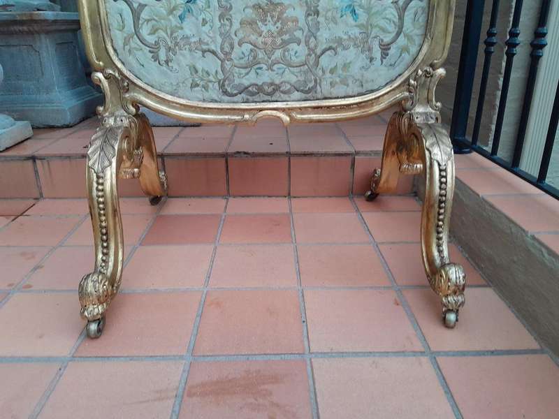 An Antique Circa 1900 French Gilt Screen with Original Castors