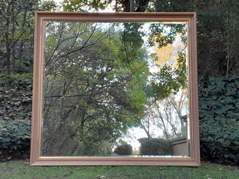 A 20th Century Massive Gilt Wood and Bevelled Mirror