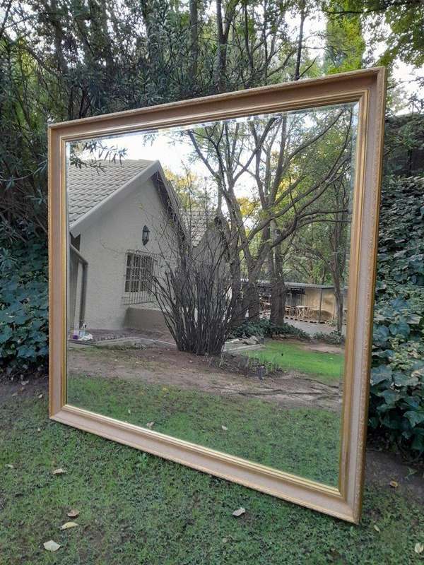 A 20th Century Massive Gilt Wood and Bevelled Mirror