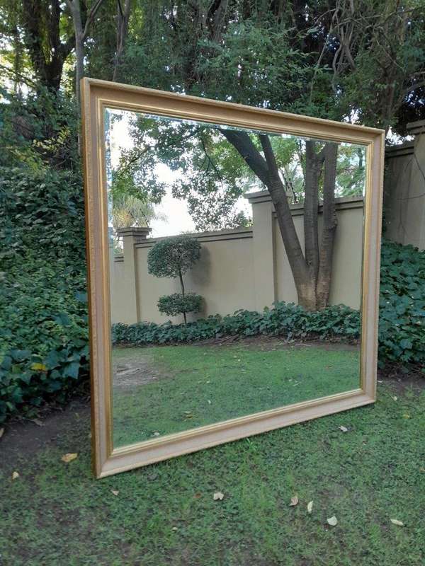 A 20th Century Massive Gilt Wood and Bevelled Mirror