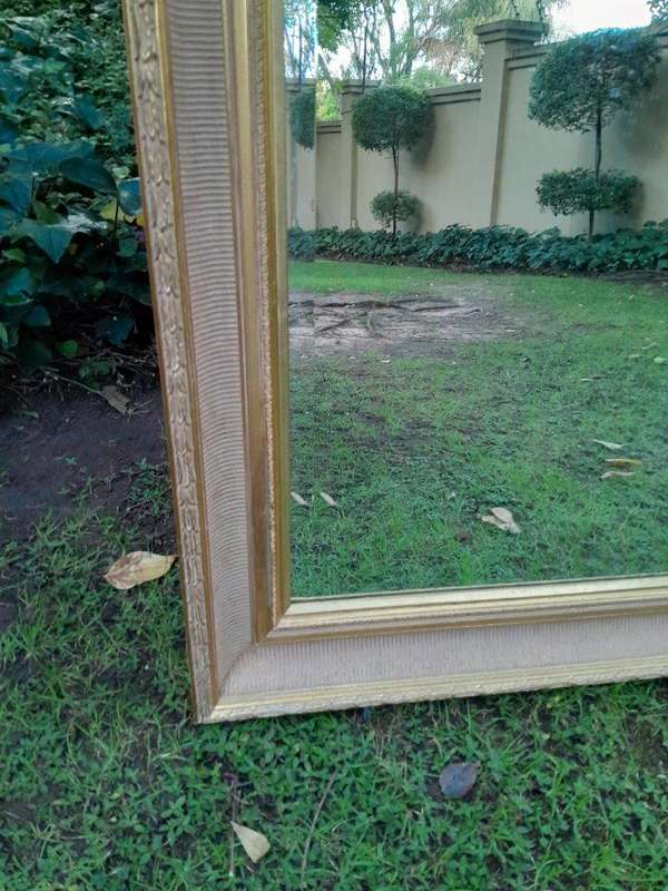 A 20th Century Massive Gilt Wood and Bevelled Mirror