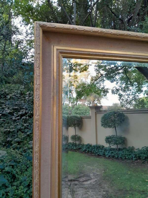 A 20th Century Massive Gilt Wood and Bevelled Mirror