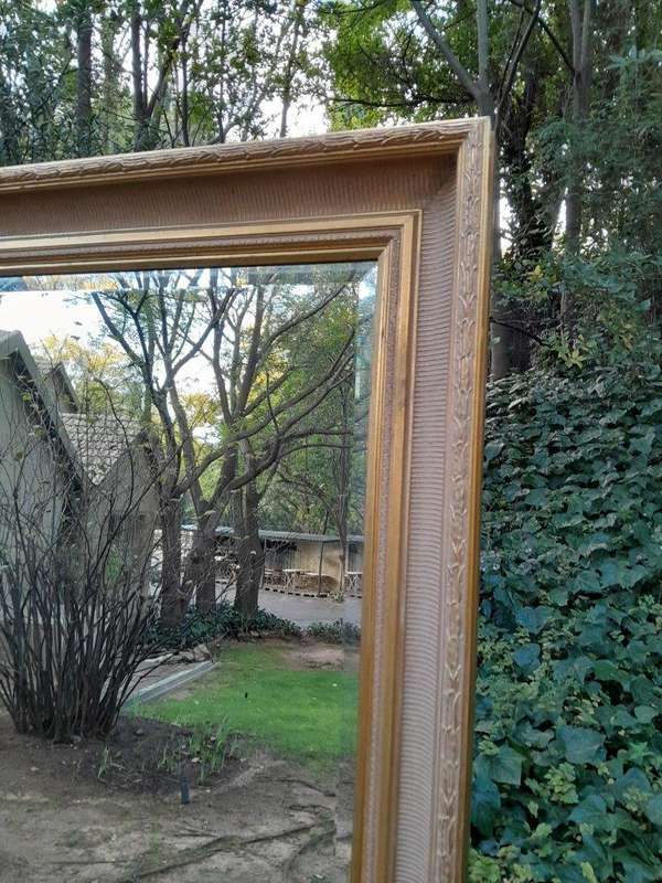 A 20th Century Massive Gilt Wood and Bevelled Mirror