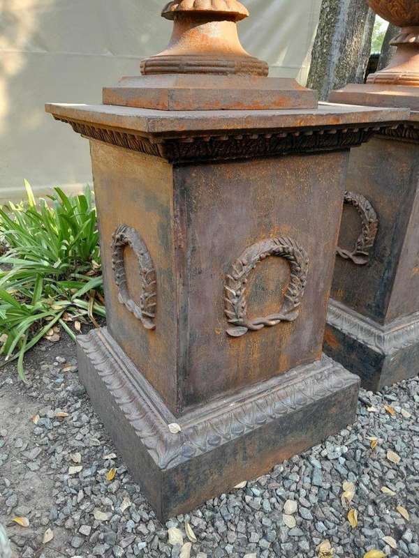 A 20TH Century Pair of French Cast Iron Urns / Planters on Plinths of Large Proportions