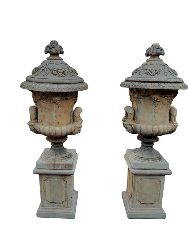 A 20th Century Pair of Large Decorative Concrete Urns with Lids on Plinths