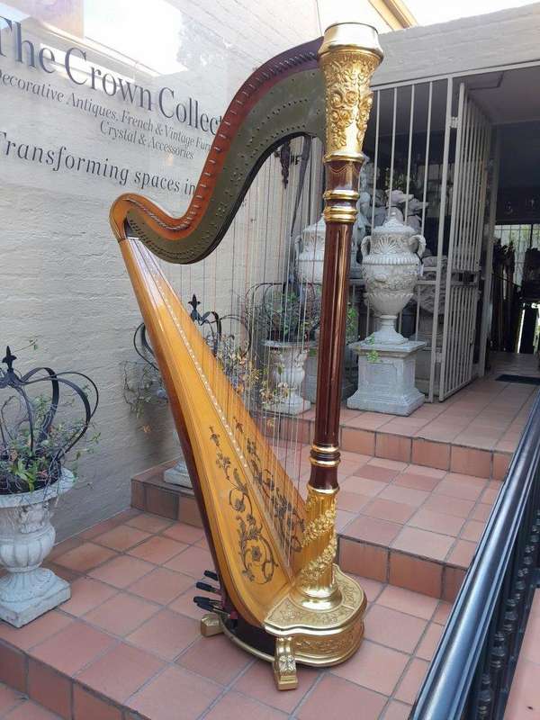 A 20th Century Venus Grand Harp on Gilt Wood Carved Base on Gilt Wood Bracket Feet.