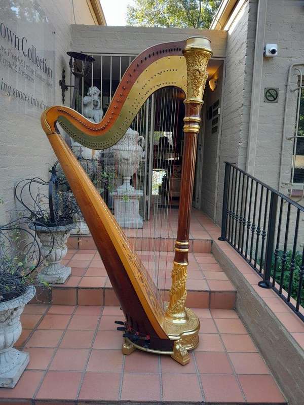 A 20th Century Venus Grand Harp on Gilt Wood Carved Base on Gilt Wood Bracket Feet.