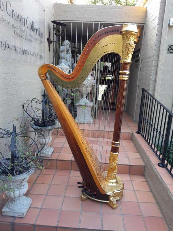 A 20th Century Venus Grand Harp on Gilt Wood Carved Base on Gilt Wood Bracket Feet.