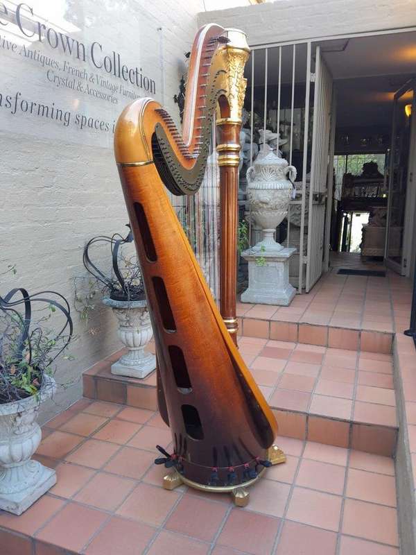 A 20th Century Venus Grand Harp on Gilt Wood Carved Base on Gilt Wood Bracket Feet.