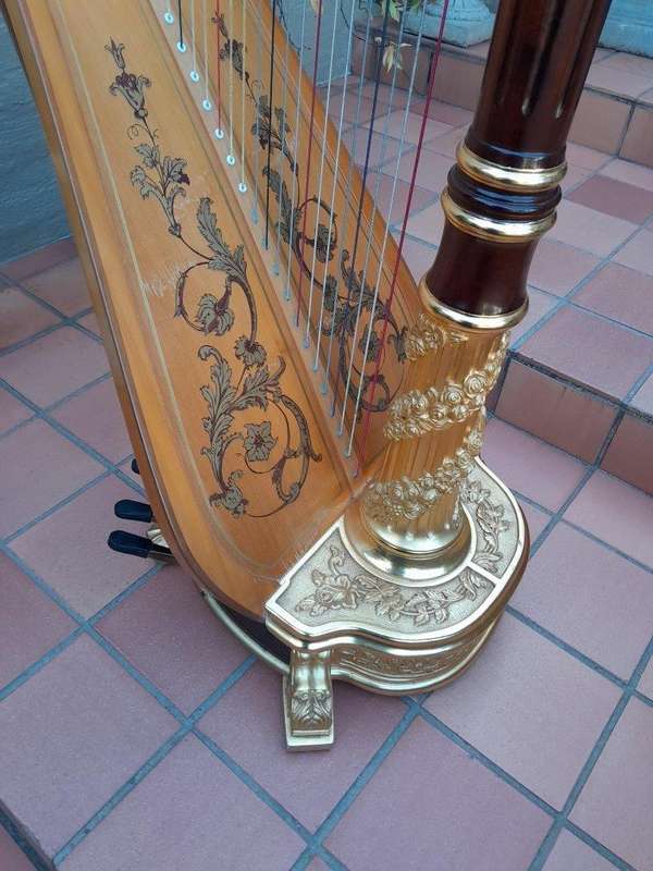 A 20th Century Venus Grand Harp on Gilt Wood Carved Base on Gilt Wood Bracket Feet.