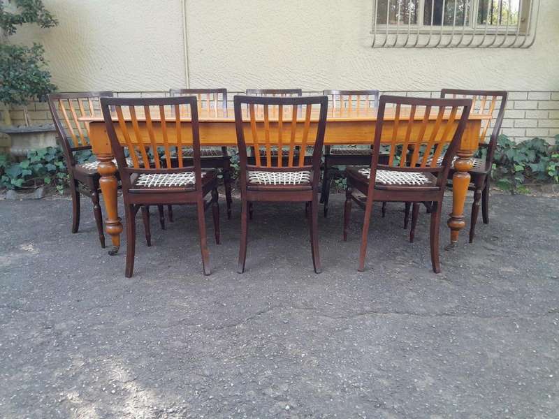 A Late 19thCentury  Early 20th Century Yellowwood Dining Table  with A 20th Century Set of Eigh...