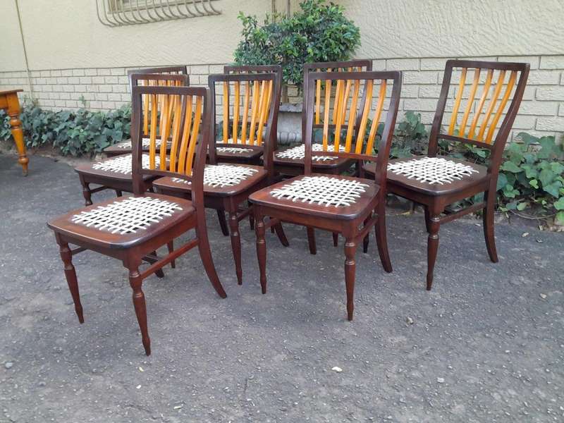 A Late 19thCentury  Early 20th Century Yellowwood Dining Table  with A 20th Century Set of Eigh...
