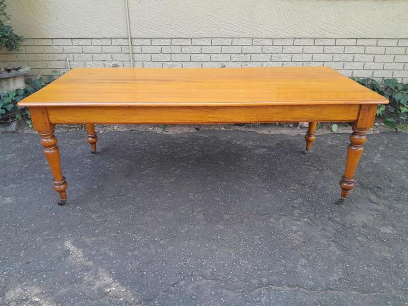 A Late 19thCentury  Early 20th Century Yellowwood Dining Table  with A 20th Century Set of Eigh...