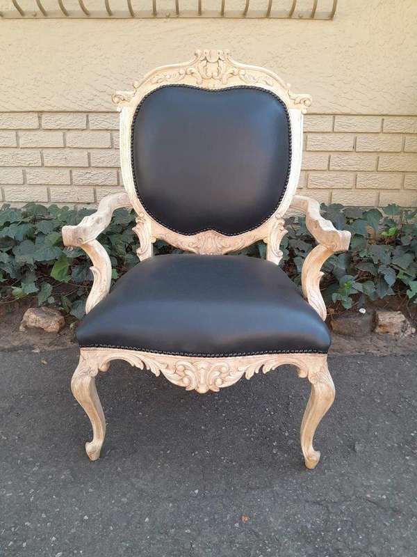 A 20th Century Pair Of French Style Carved Oak Armchairs In A Contemporary Bleached Finish And Up...
