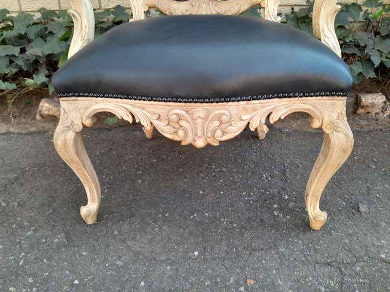 A 20th Century Pair Of French Style Carved Oak Armchairs In A Contemporary Bleached Finish And Up...