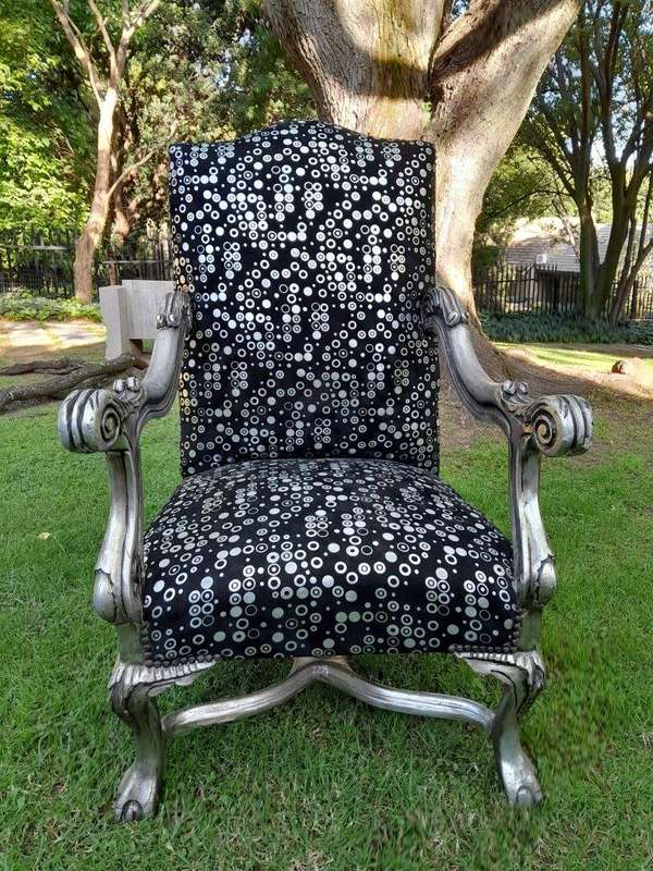 A 20th Century French Style Ornately Carved Pair Of Arm Chairs Hand Gilded And Upholstered In A D...