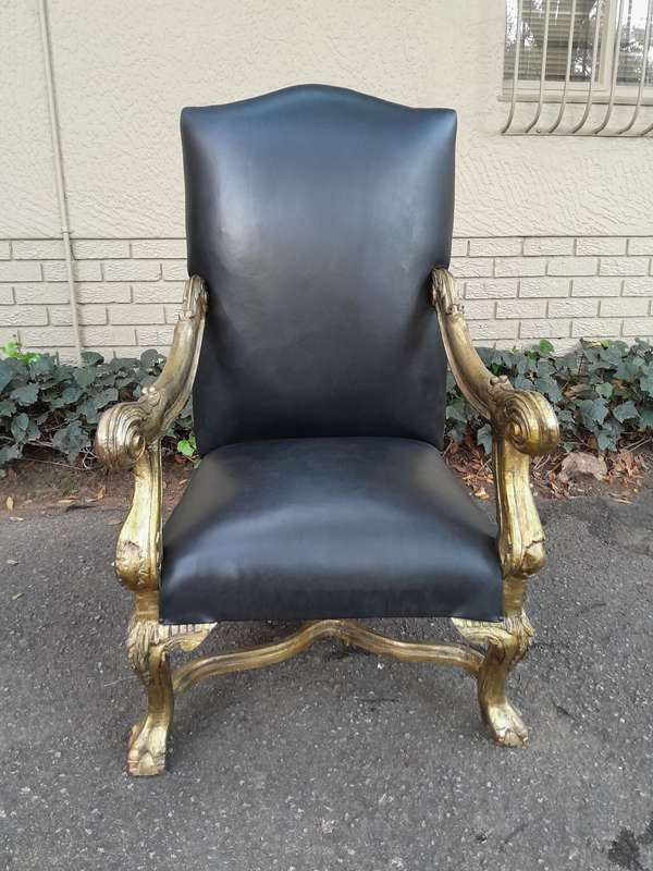 A 20th Century French Style Ornately Carved Pair Of Arm Chairs Hand Gilded And Upholstered In A D...