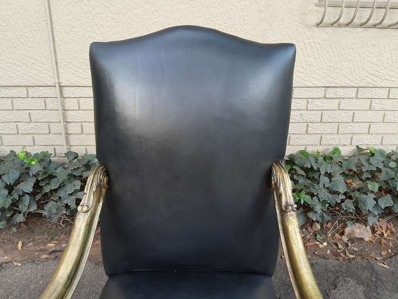 A 20th Century French Style Ornately Carved Pair Of Arm Chairs Hand Gilded And Upholstered In A D...