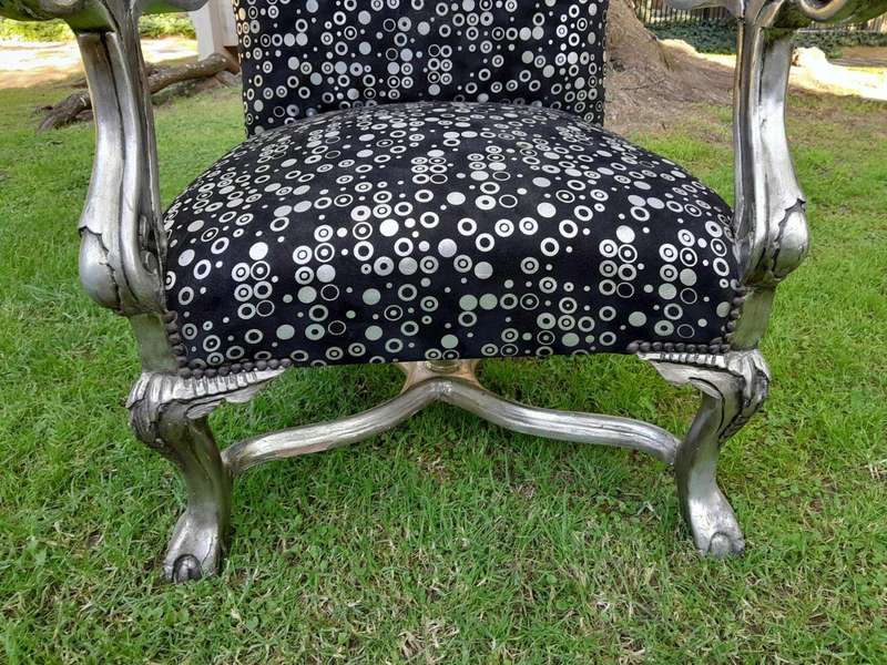 A 20th Century French Style Ornately Carved Pair Of Arm Chairs Hand Gilded And Upholstered In A D...