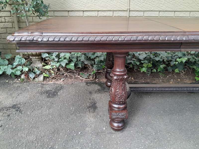 A 20th Century Carved Rosewood Dining / Refectory / Entrance Table With Two Extending Leaves