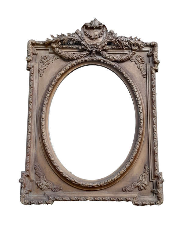 A French Rococo Style Ornately Carved and Gilded Bevelled Mirror