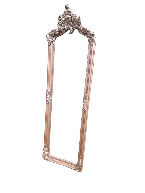 A French Rococo Style Ornately Carved and Gilded Bevelled Mirror